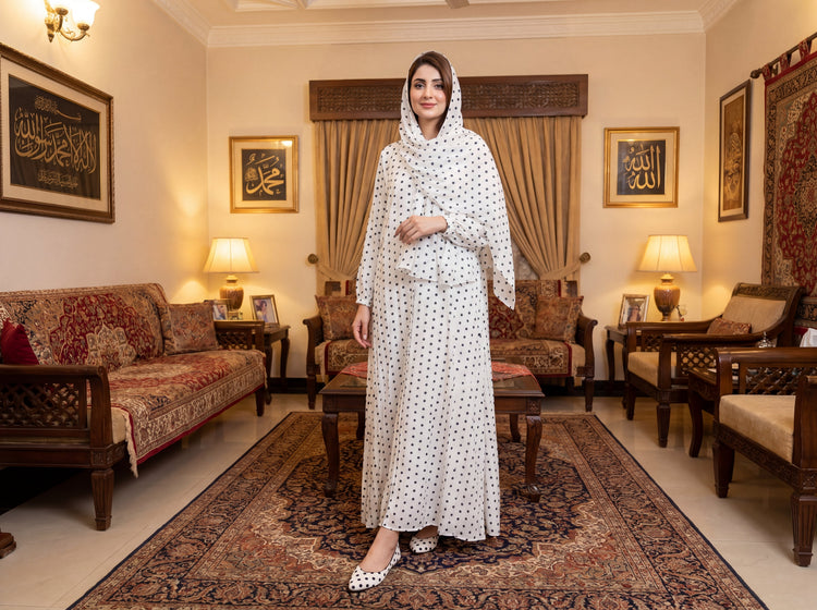 white abaya with black dots